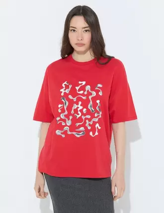 T-shirt oversize rouge à motif offre à 15,99 Dh sur Jennyfer